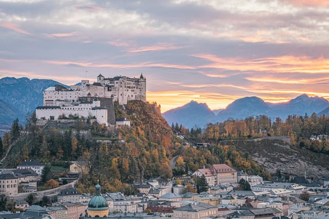 Hohensalzburg Fortress above the autumn old town at sunset