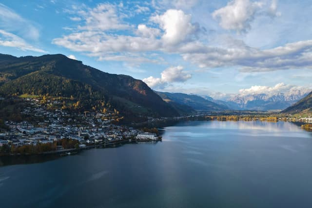 Zell am See on its lake with snow-capped mountains
