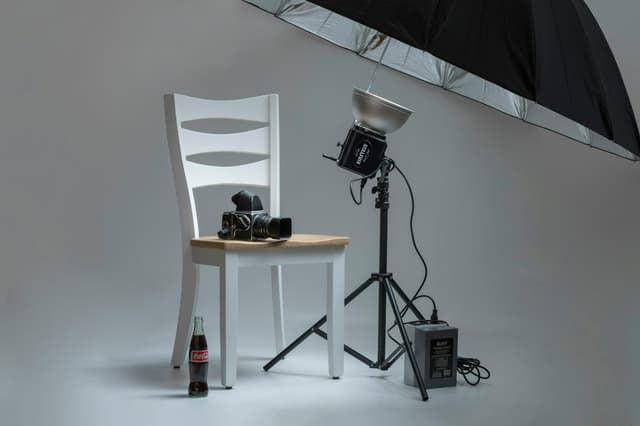 Studio setup with flash and umbrella for product photos